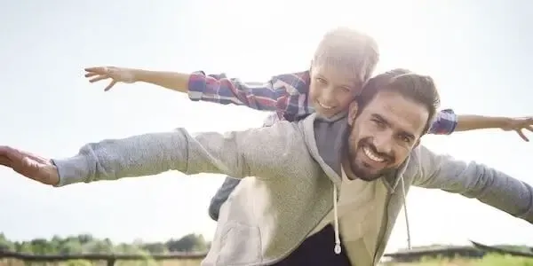 dad playing with kid - neuroplasticity kids and adults 